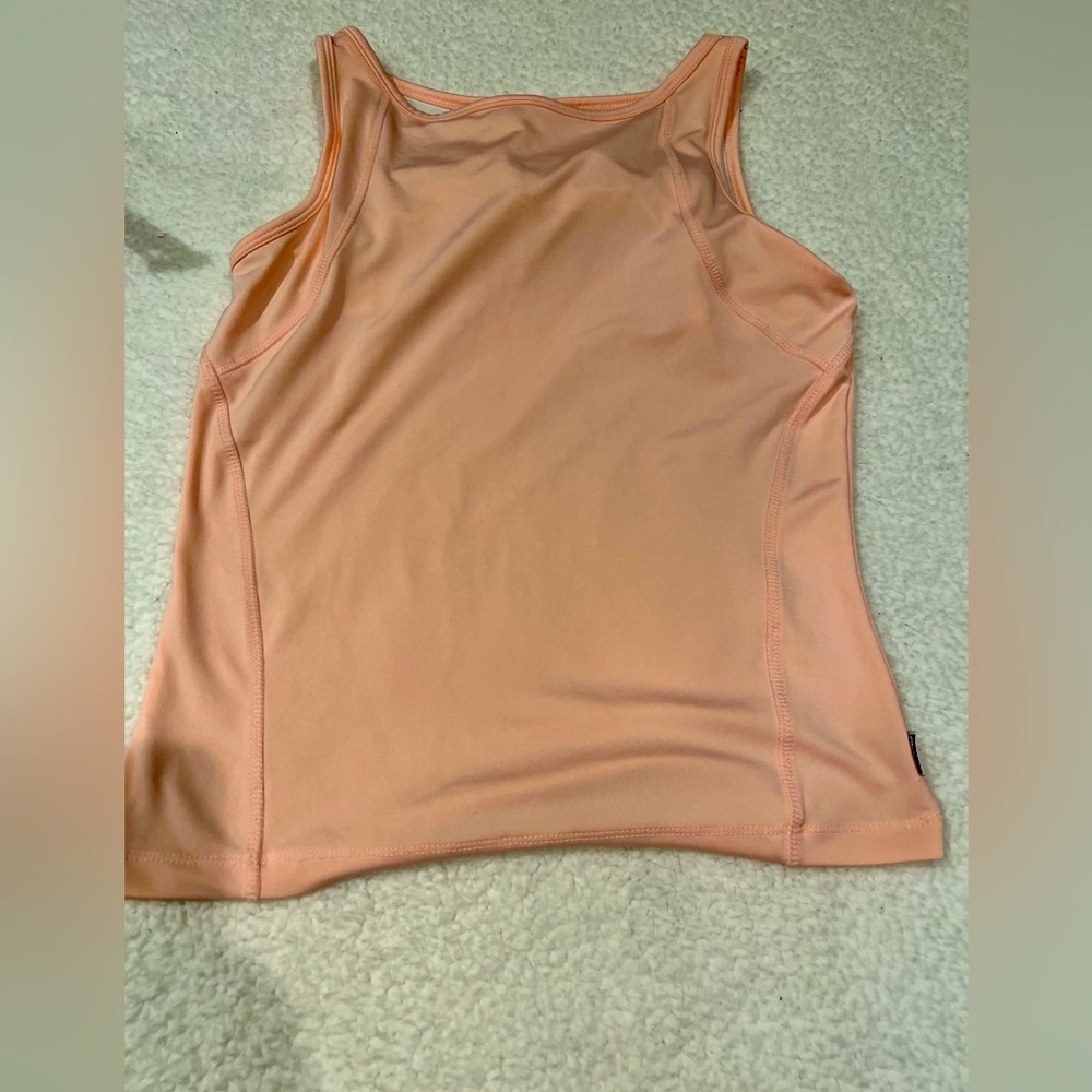 Its two top the colors  beige and another is white